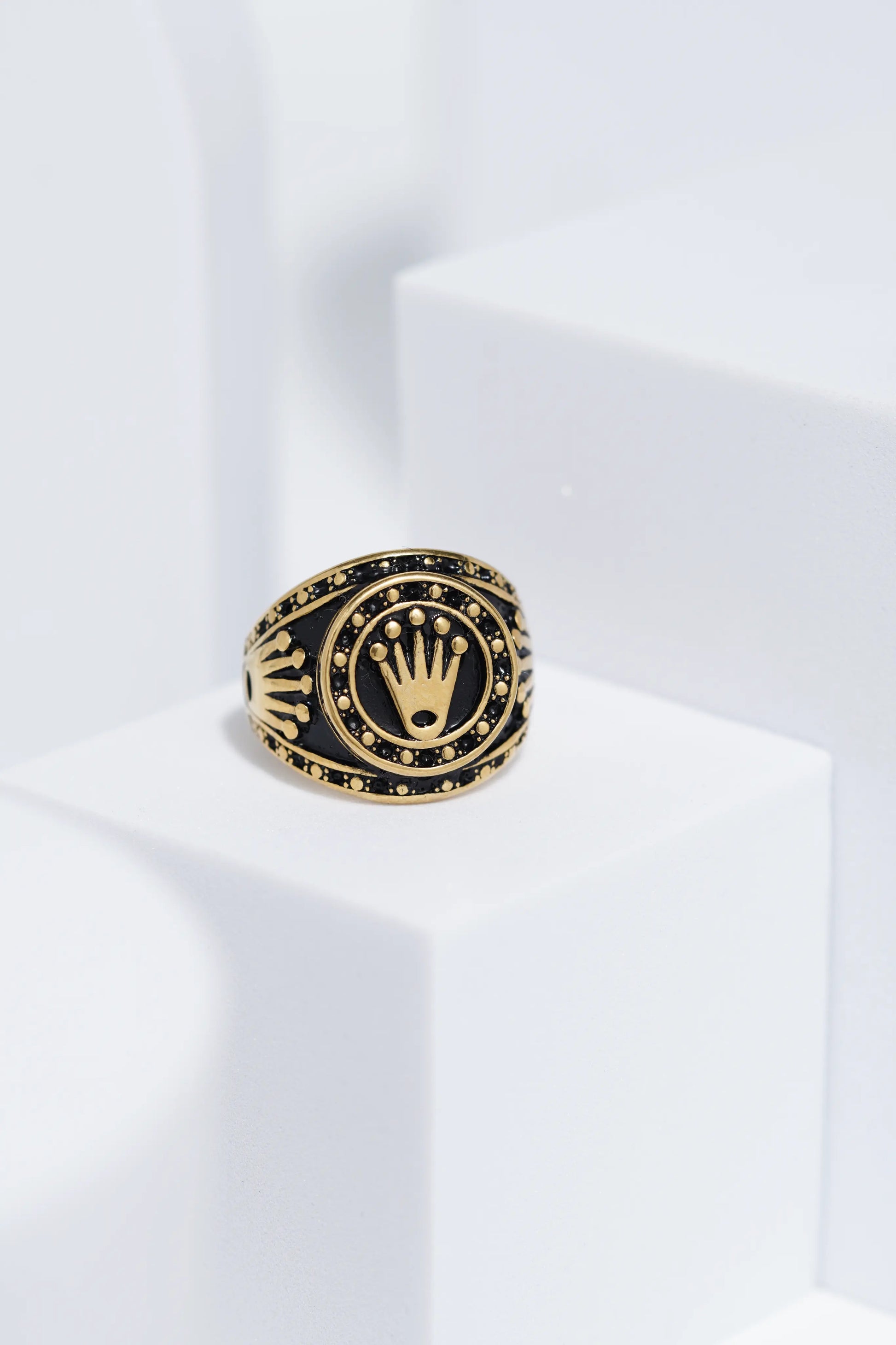 Crown Embossed Black Polish In Golden Color Stainless Steel Ring For Men. worldjewel.in men's ring