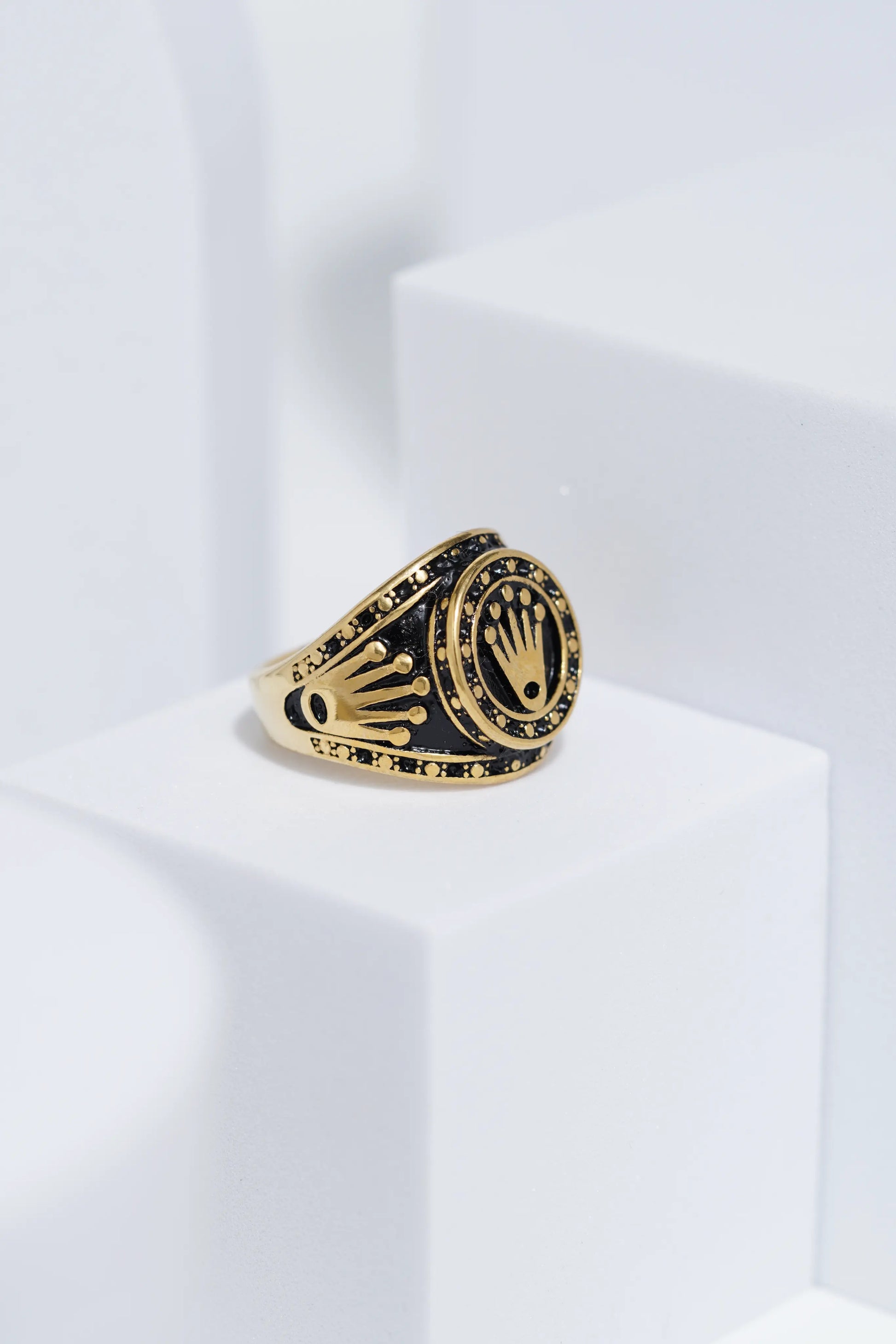 Crown Embossed Black Polish In Golden Color Stainless Steel Ring For Men. worldjewel.in men's ring