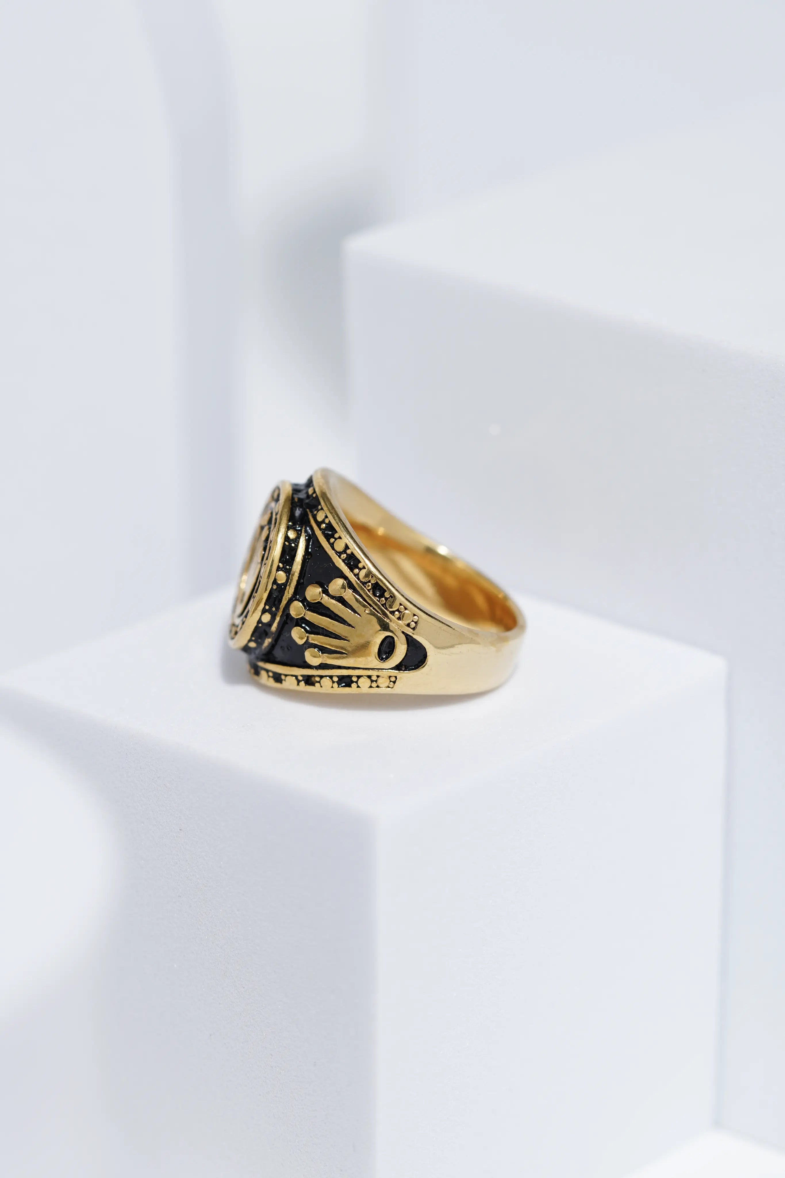 Crown Embossed Black Polish In Golden Color Stainless Steel Ring For Men. worldjewel.in men's ring