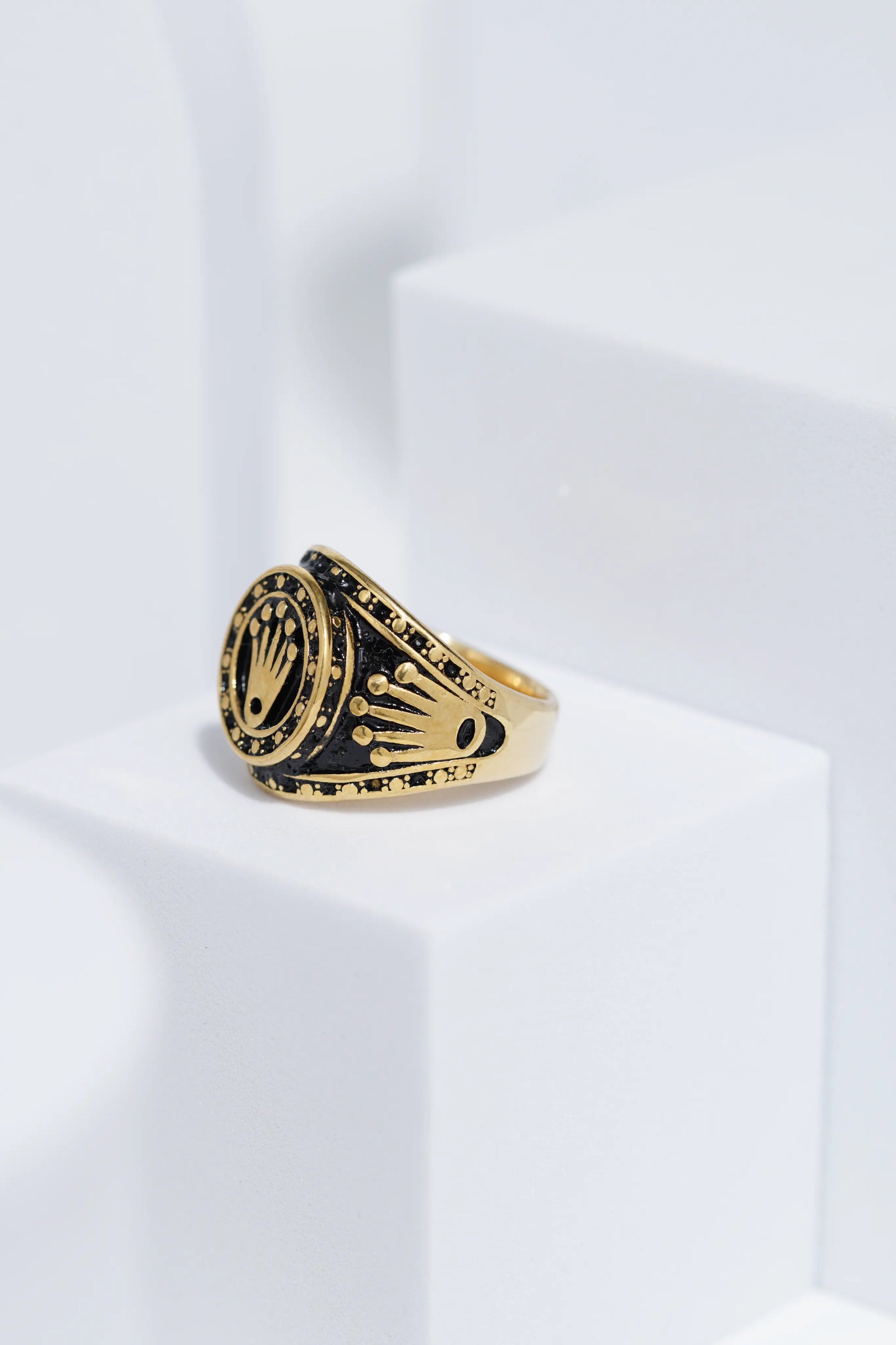 Crown Embossed Black Polish In Golden Color Stainless Steel Ring For Men. worldjewel.in men's ring