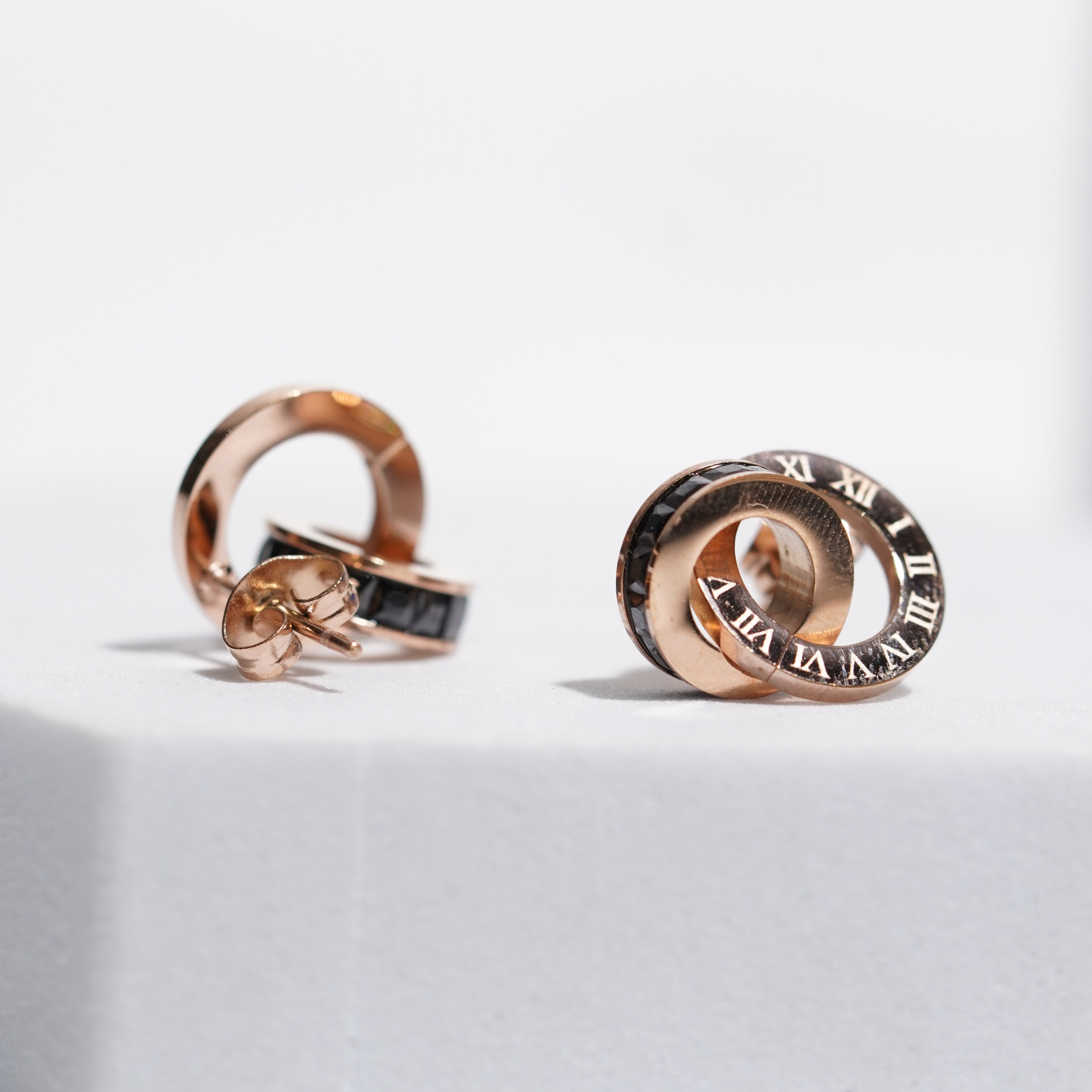 Roman carved studs