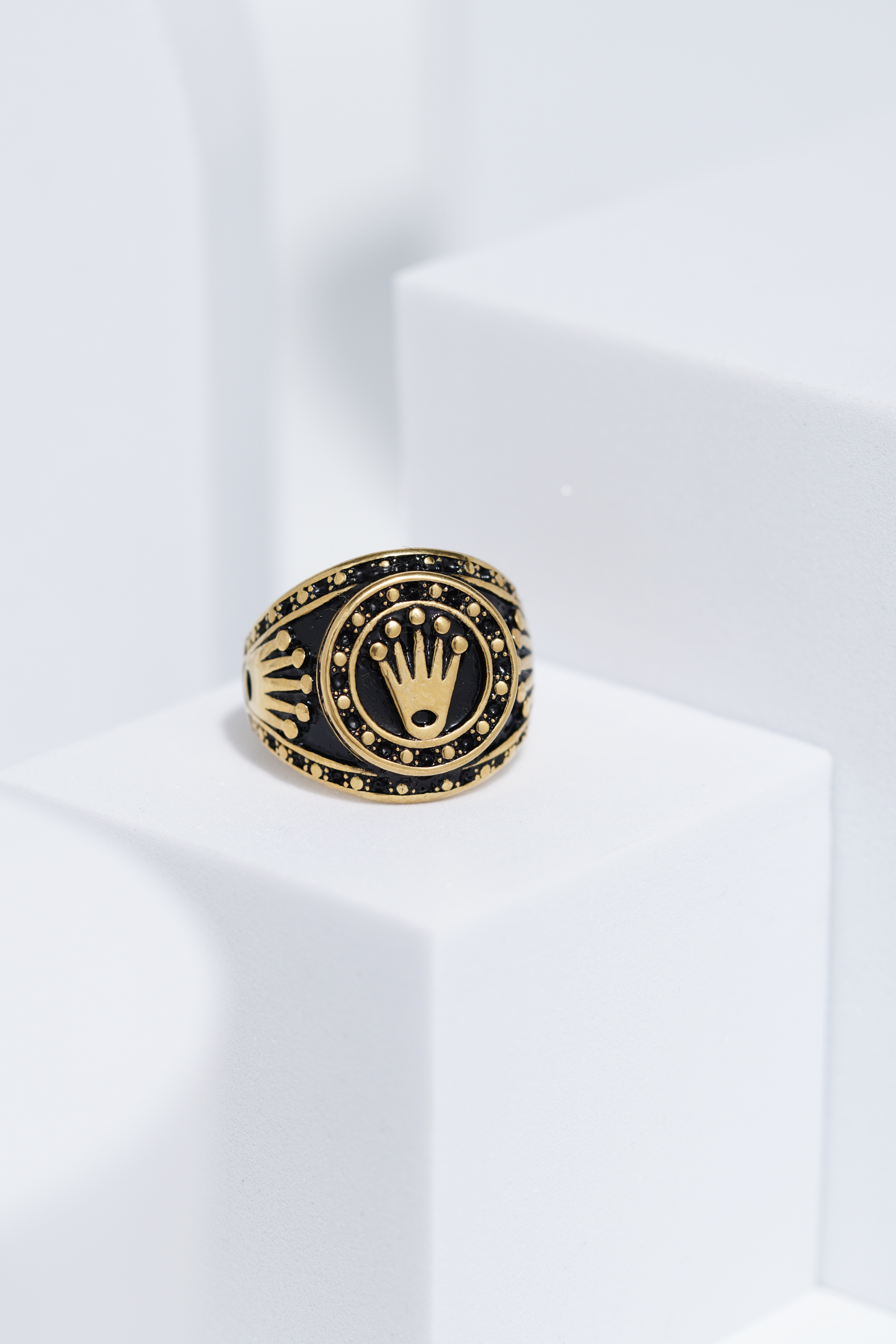 Crown Embossed Black Polish In Golden Color Stainless Steel Ring For Men. worldjewel.in men's ring