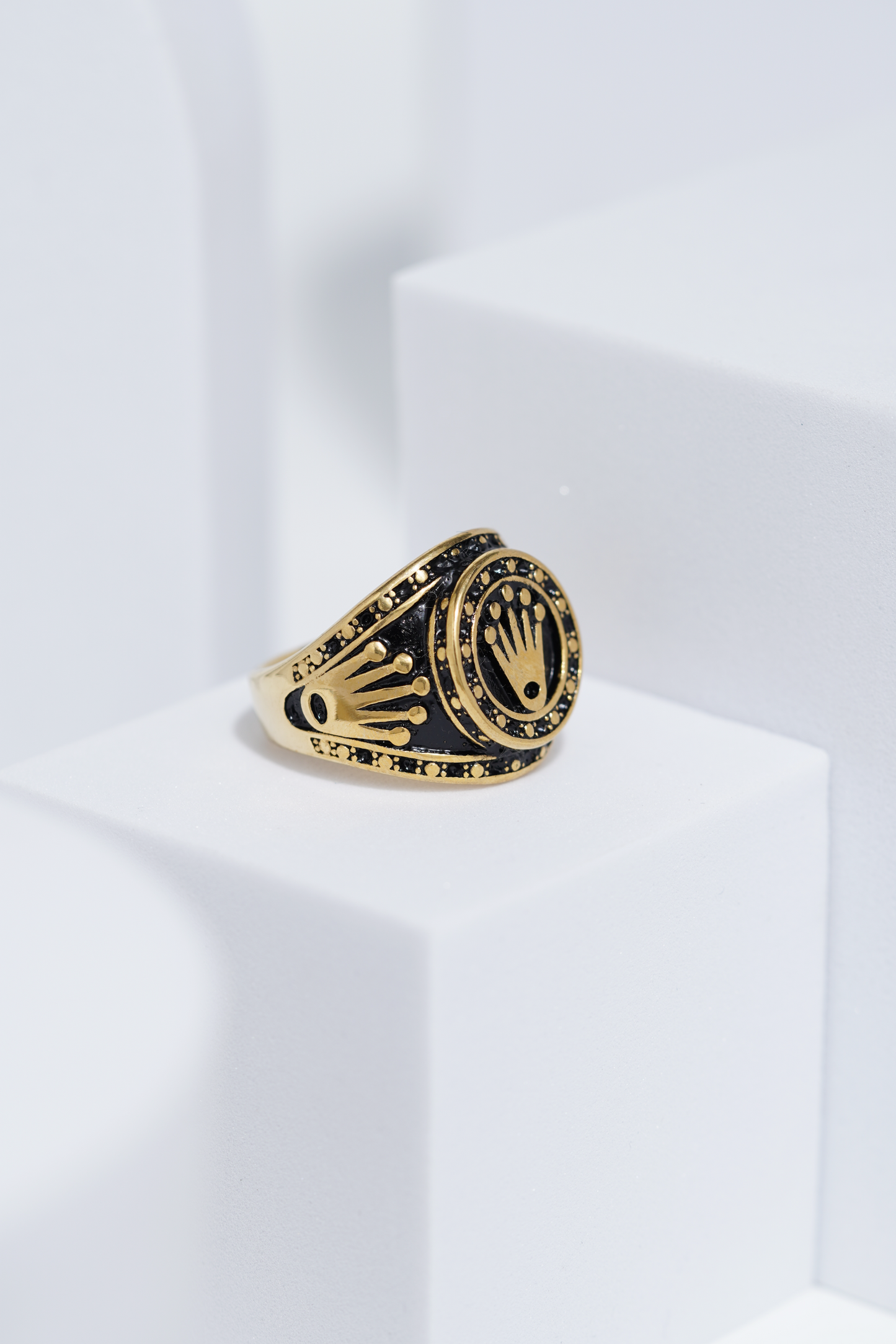 Crown Embossed Black Polish In Golden Color Stainless Steel Ring For Men. worldjewel.in men's ring