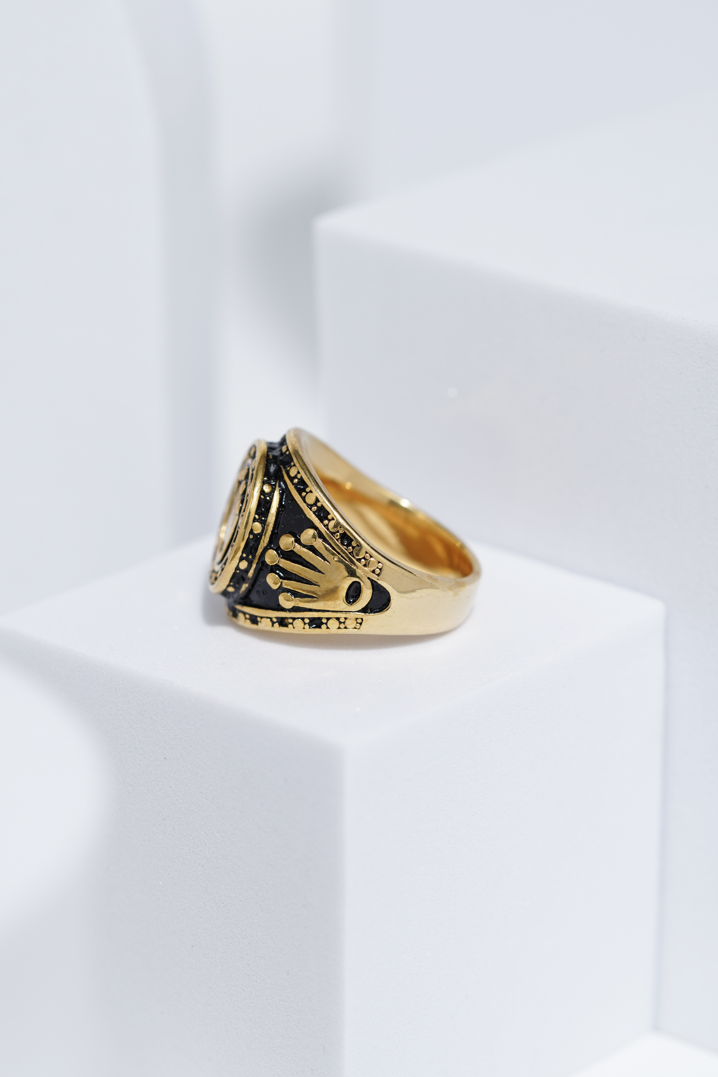 Crown Embossed Black Polish In Golden Color Stainless Steel Ring For Men. worldjewel.in men's ring