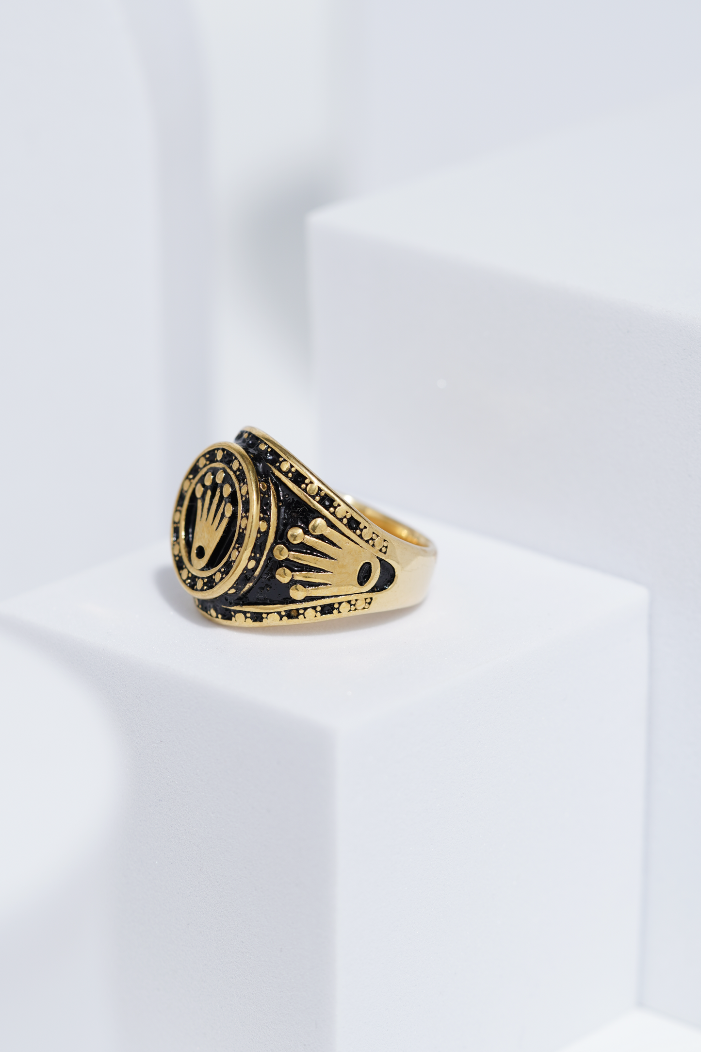 Crown Embossed Black Polish In Golden Color Stainless Steel Ring For Men. worldjewel.in men's ring