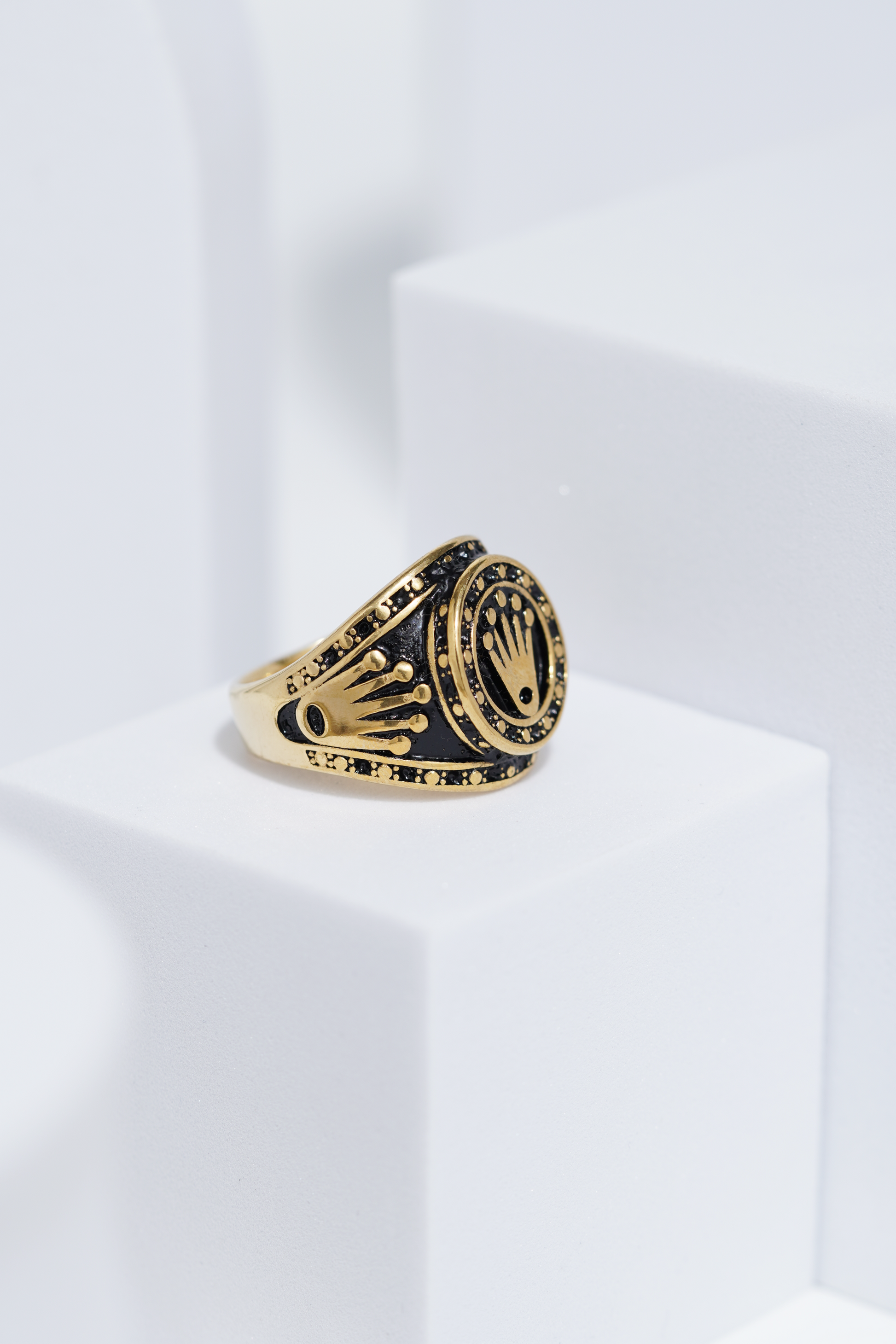 Crown Embossed Black Polish In Golden Color Stainless Steel Ring For Men. worldjewel.in men's ring